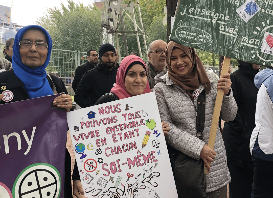 Protestors ralling to protest against Bill 21